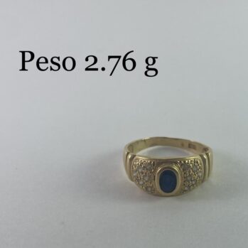 Anillo con diseño de circones y piedra azul
