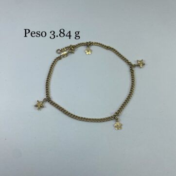 Pulseras con dije de estrellas y flores
