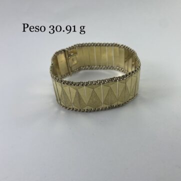 Brazalete larga con diseño rígido
